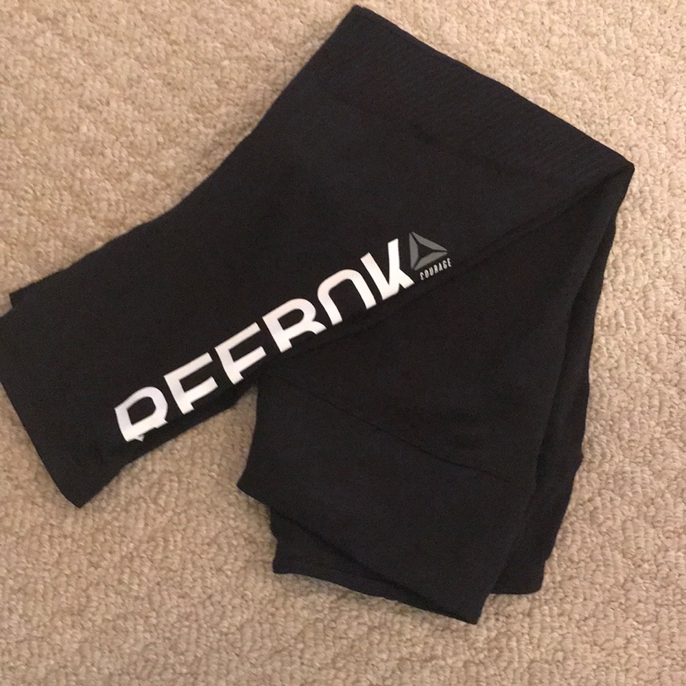 Reebok workout pants. Not full length.